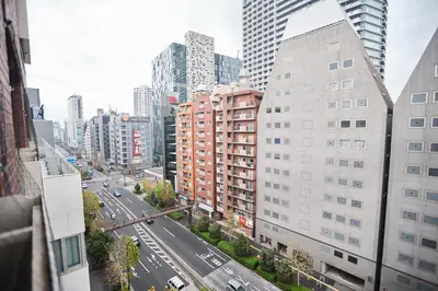 a view of a street in a city with tall buildings at \u65b0\u5bbf\u5e02\u4e2d\u5fc3\u6b4c\u821e\u4f0e\u807d\u8fd1\u4f0a\u52e2\u4e39\u6771\u65b0\u5bbf\u7ad9\u5f92\u6b653\u5206\u9418#11 in Tokyo