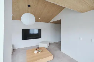 a living room with a table and a tv at Ebisu2 Lux Villa 6 min Shibuya 4min Ebisu in Tokyo