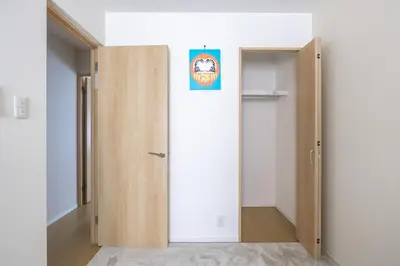 a room with a door with a sign on it at Featured Japanese Culture Hut Experience Tokyo's Local Life in a Two-Story Detached B&B in Tokyo