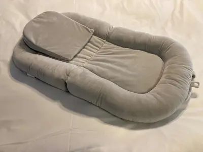 a bean bag chair sitting on top of a bed at Marble TOKYO Base Tabata 202 in Tokyo