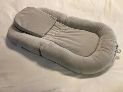 a bean bag chair sitting on top of a bed at Marble TOKYO Base Tabata 201 in Tokyo