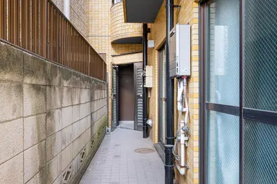 an empty hallway of a building with a walkway at Marble TOKYO Base Tabata 301 in Tokyo
