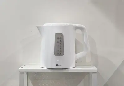 a white appliance is sitting on a white shelf at Marble TOKYO Base Tabata 301 in Tokyo