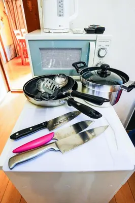 a counter with some utensils on top of a stove at Real Japanese Culture Stay Shibamata Near Asakusa in Tokyo