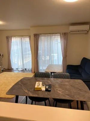 a living room with two tables and a couch at Tokyo Koya Station on walk2mins\u65b0\u7bc9\u5225\u8358\u7121\u6599\u99d0\u8eca\u58344LDK-free-wifi in Tokyo