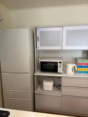 a kitchen with a white refrigerator and a microwave at Tokyo Koya Station on walk2mins\u65b0\u7bc9\u5225\u8358\u7121\u6599\u99d0\u8eca\u58344LDK-free-wifi in Tokyo