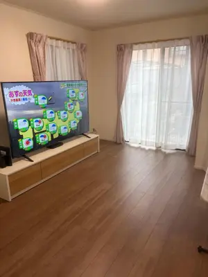a living room with a large flat screen tv at Tokyo Koya Station on walk2mins\u65b0\u7bc9\u5225\u8358\u7121\u6599\u99d0\u8eca\u58344LDK-free-wifi in Tokyo