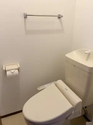 a white bathroom with a toilet and a sink at ISSHUKU NOMA\u6c60\u888bII 201 - Spacious Room for 5 Guests in Tokyo