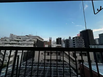 a view of a city from a balcony at 5F Spacious Apartment in Shinjuku Tokyo in Tokyo