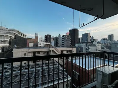 a view of a city skyline from a balcony at 5F Spacious Apartment in Shinjuku Tokyo in Tokyo
