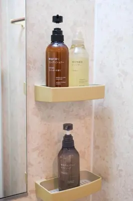 two bottles of soap and a mirror in a bathroom at Urban Hills IKEBUKURO 51sqm Big 1LDK 5people Beautiful Japanese Interior in Tokyo