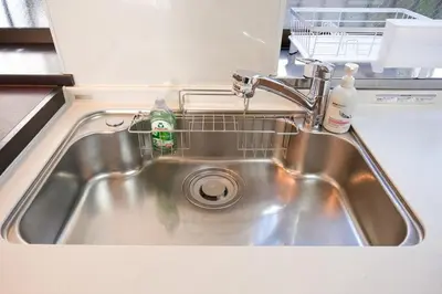a kitchen sink with a dish rack in it at Urban Hills IKEBUKURO 51sqm Big 1LDK 5people Beautiful Japanese Interior in Tokyo