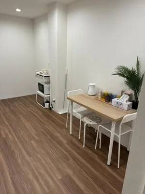 a dining room with a table and chairs at C&H hotel2F in Tokyo