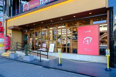 a store front with a pink sign in front of it at F-City \u4e2d\u845b\u897f I in Tokyo