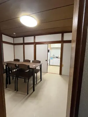 a dining room with a table and chairs at Koenji house in Tokyo
