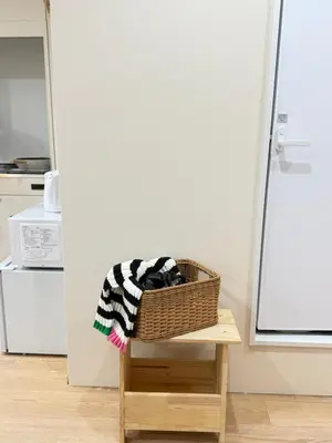 a basket sitting on a table in a kitchen at C&H 5丁目B1ｆ in Tokyo