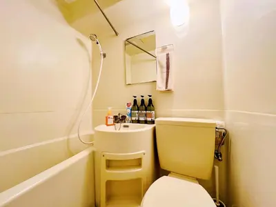 a small bathroom with a toilet and a sink at TokyoShinjuk Station800meterskabukicho2minutes101 in Tokyo