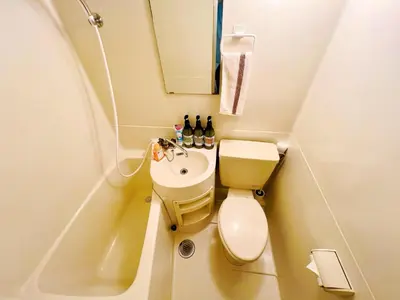 a small bathroom with a toilet and a sink at TokyoShinjuk Station800meterskabukicho2minutes101 in Tokyo