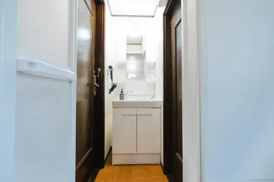 a bathroom with a sink and a mirror at Magome tokyo stay in Tokyo