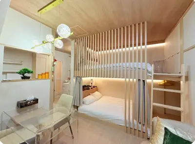 a small room with a bed and a glass table at Designers apartment Shibuya Shinjuku area in Tokyo