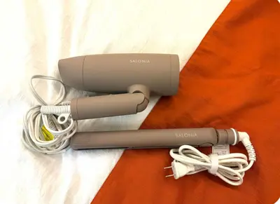 aintendo wii system with a cord and a charger at Designers apartment Shibuya Shinjuku area in Tokyo