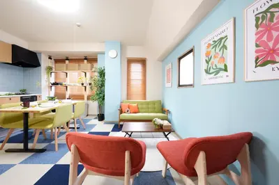 a kitchen and living room with a table and chairs at Shamrock Aoto 301 Cozy Tokyo Stay Near Station Airport Disney Access in Tokyo