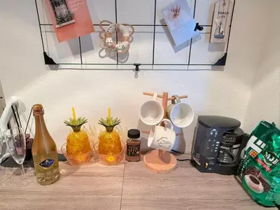 a kitchen counter with bottles and other items on it at Cozy APT Stay in Center Tokyo -SHIBUYA in Tokyo
