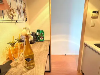 a bottle of wine on a counter in a kitchen at Cozy APT Stay in Center Tokyo -SHIBUYA in Tokyo