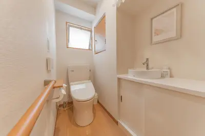 a bathroom with a toilet and a sink at Ginza401 Tsukiji 3mins,Tsukiji Market in Tokyo