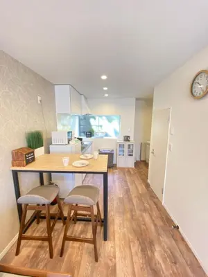 a kitchen and dining room with a table and chairs at Hale Akasaka - The House in Tokyo