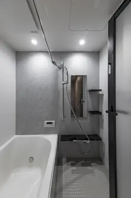 a bathroom with a bath tub and a sink at 201 Maison de Bohème Ryogoku in Tokyo