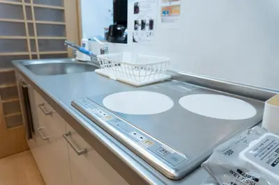 a laboratory counter with a sink and a counter top at Skytree-House\u6771\u5411\u5cf6 in Tokyo