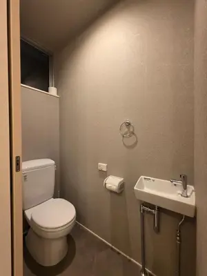 a bathroom with a toilet and a sink at Sumika House in Asakusa , 5 minutes walk to asakusa ST ATION 5 bedrooms, 2 living room 2kitchen 4toilet 2bathroom 2washmachine 2fridge Newly renovated with ultra-fast WiFi in Tokyo