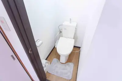 a small bathroom with a toilet in a room at Skytree View Heights in Tokyo