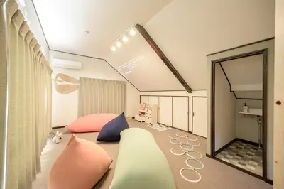 a room with a mirror and pink pillows at Ueno Asakusa Area Spacious 90sqm Home Comfortable Tokyo Stay Up to 8 Guests in Tokyo