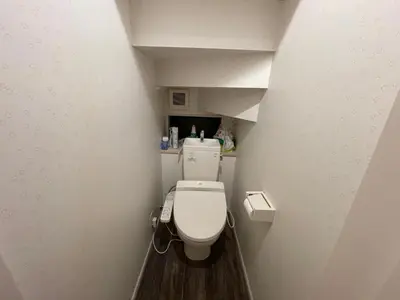 a bathroom with a toilet in a small room at Prime Shinjuku - 12min to Kabukicho - Quiet Park Area - Entire House - 3BD 6Beds - 70 sqm 750 sqft in Tokyo