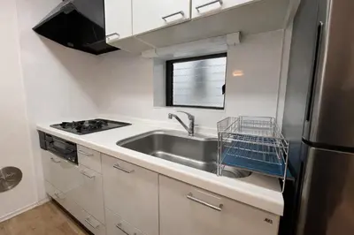 a kitchen with a sink and a stove at Prime Shinjuku - 12min to Kabukicho - Quiet Park Area - Entire House - 3BD 6Beds - 70 sqm 750 sqft in Tokyo
