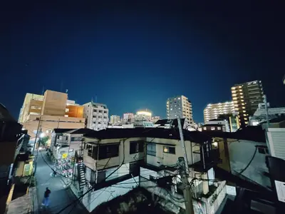 a view of a city at night with buildings at Newly built house with free parking, 3 minutes walk from Shinkoiwa Station in Tokyo