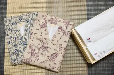 a jacket and a book on a table at Edelweiss 301 in Tokyo