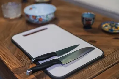 a knife and spatula sitting on top of a table at Kameido Saryo in Tokyo