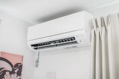 a white air conditioner hanging from a ceiling at Shinjuku Area Top-Tier Luxury, 4 min Walk to Station, Stay in a Traditional Japanese Beauty Ukiyo-e Art Villa, Shinjuku 13 min, Sleeps 8, Entire New 3BR House, 60sqm, Free Parking, Roppongi and Tsukiji direct access in Tokyo