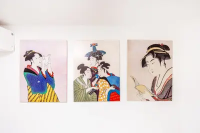 four paintings of geisha on a wall at Shinjuku Area Top-Tier Luxury, 4 min Walk to Station, Stay in a Traditional Japanese Beauty Ukiyo-e Art Villa, Shinjuku 13 min, Sleeps 8, Entire New 3BR House, 60sqm, Free Parking, Roppongi and Tsukiji direct access in Tokyo