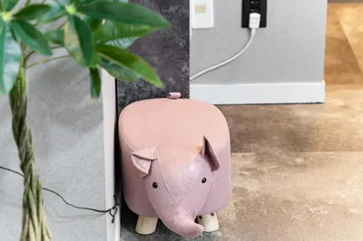 a pink elephant shaped object is plugged into an outlet at SHINBASHI Station A major hub station ideal for Tokyo sightseeing Numerous restaurants and eateries surround the station Enjoy your stay on the top floor of the building without worrying about noise Elevator available in Tokyo