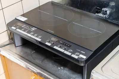 a stove top oven sitting on top of a counter at Asakusa, Ueno, Akihabara MAX 6 guests Entire building rental Ideal base for Tokyo sightseeing Manga, games, large-screen TV in Tokyo