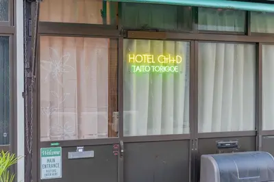 a building with a door with a sign on it at Asakusa, Ueno, Akihabara MAX 6 guests Entire building rental Ideal base for Tokyo sightseeing Manga, games, large-screen TV in Tokyo
