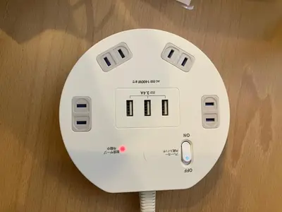 a nintendo wii game controller sitting on a table at Asakusa, Ueno, Akihabara MAX 6 guests Entire building rental Ideal base for Tokyo sightseeing Manga, games, large-screen TV in Tokyo