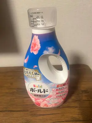 a plastic bottle of yogurt with a plastic spoon in it at 103 Shin Okubo area & Quiet stay in central of Tokyo in Tokyo