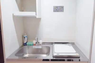 a small kitchen with a sink and a toaster at Astra Nakano hostel max6 people NN0494 in Tokyo