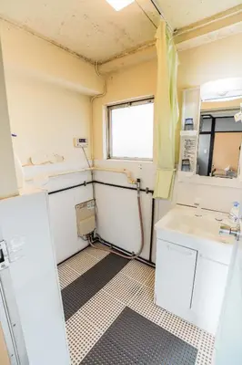 a small bathroom with a sink and a mirror at 203Room 1 Stop from Ikebukuro Entire 35m on 2st Floor 2 Bedrooms for up to 6 Guests 3Minute Walk to Don Quijote in Tokyo