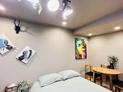 a bedroom with a bed and a table at Tokyo ShinjukStation 800meters kabukicho2minutes 403 in Tokyo